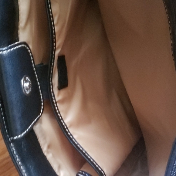 BLACK bag. Perfect for travel or work. Many pockets on outside and inside. - Picture 6 of 11